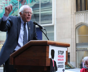 Photo of Bernie Sanders speaking at a podium