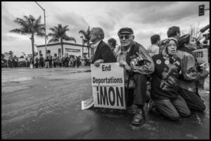 Black and white photo of people at a protest