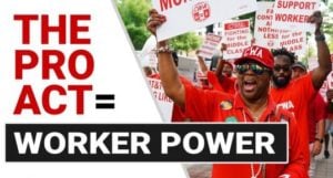 Text in left section of rectangle reads: “The PRO Act = Worker Power.” Right section shows members of the Communications Workers of America marching, chanting, wearing red T-shirts with white lettering and carrying white signs with red lettering. Those in the foreground are Black men wearing CWA caps.