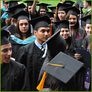 Group of people wearing graduation caps and gowns