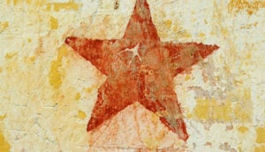 White background with yellow splashes and superimposed by a red star