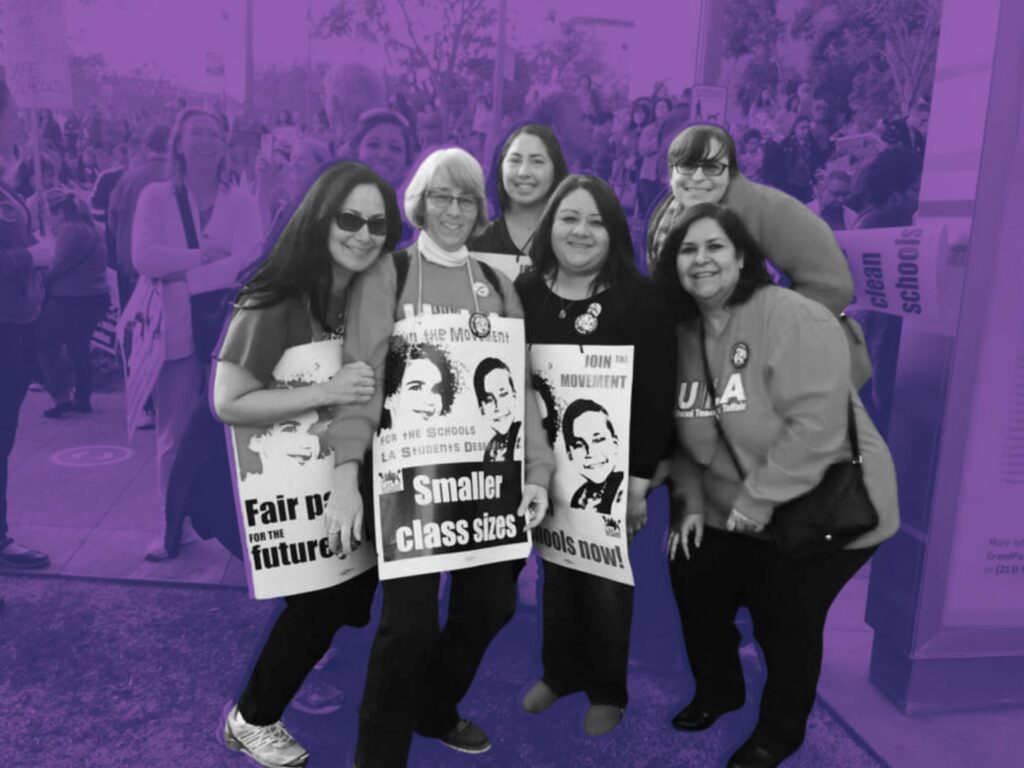 Six women (black and white againsta a purple duotone background) smilng and posing with signs. The most visible sign reads "smaller class sizes." The women are apparently a diverse crew.