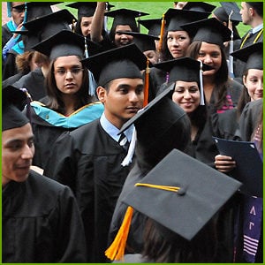 Group of people wearing graduation caps and gowns