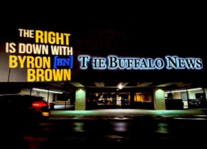 Light projection that says "The Right is Down with Byron Brown"